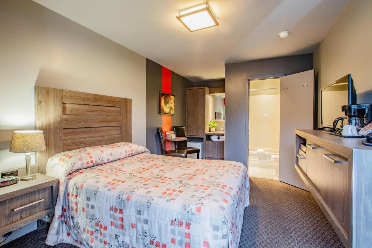 Hotel Et Motel Le Chateauguay Ciudad de Quebec Habitación foto